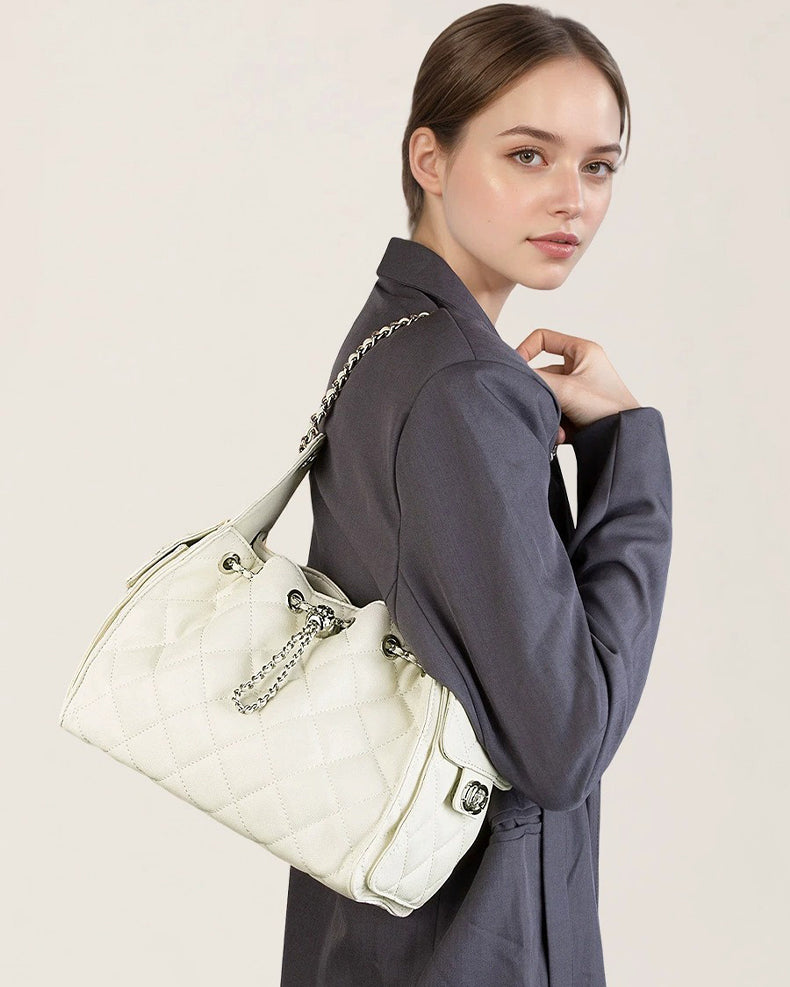 a off-white Cowhide handbag with a chain detail