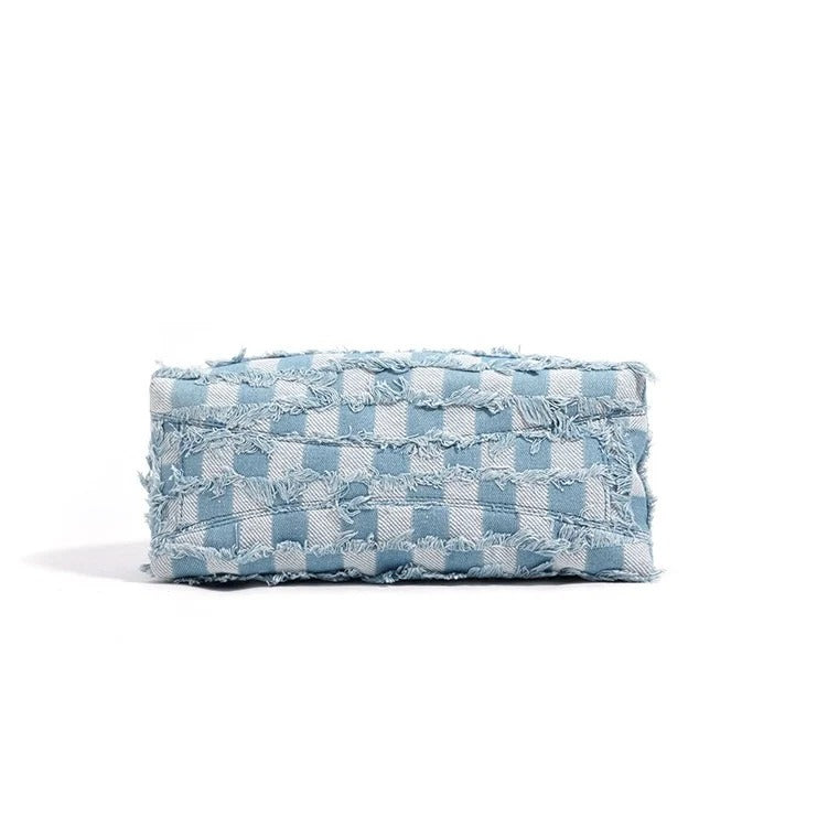 Blue and white checkered clutch bag