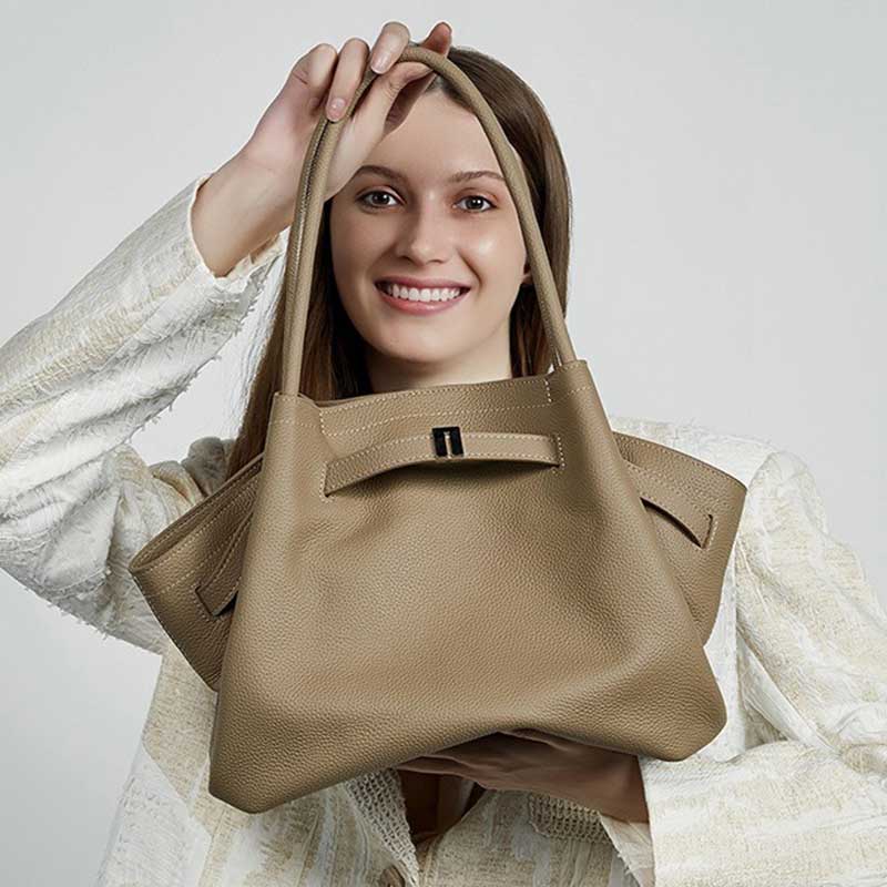 Woman holding a gray Large Capacity Tote Bag