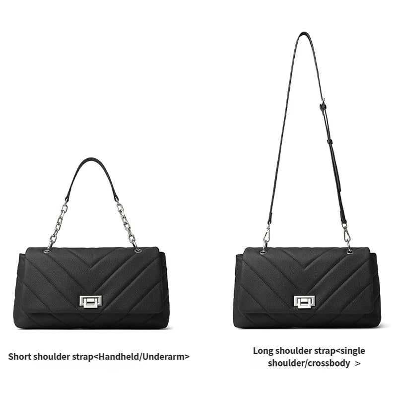 Black handbag with short shoulder strap on the left and long shoulder strap