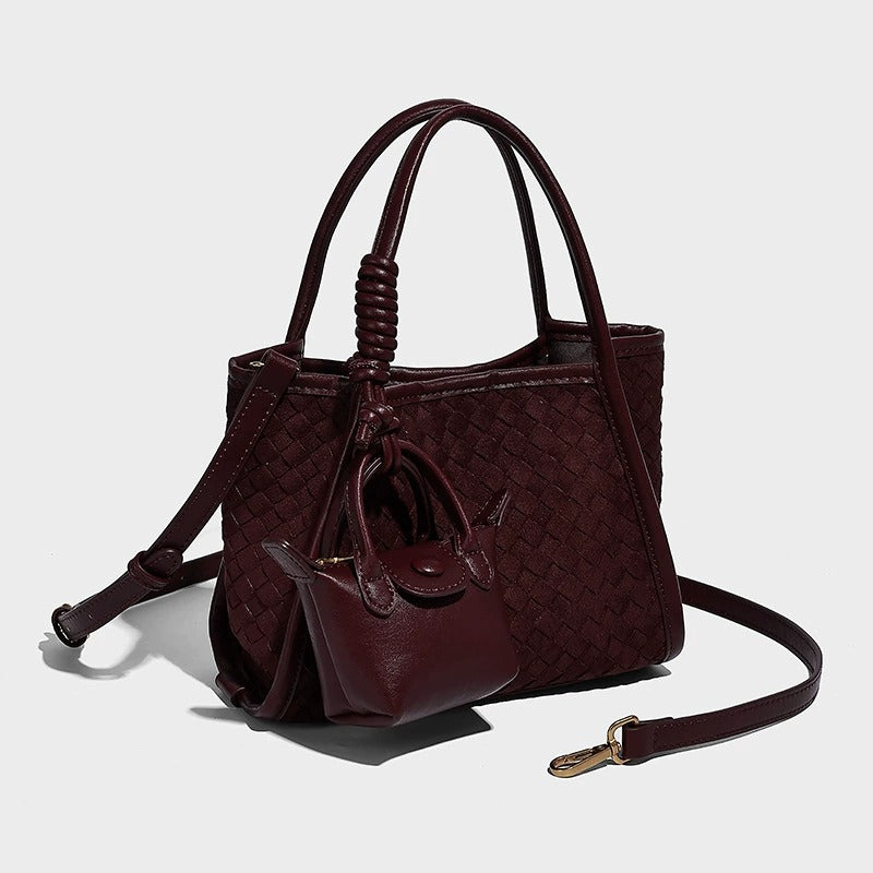 burgundy quilted handbag with a matching pouch