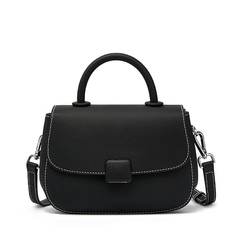black_leather_top_handle_handbags_crossbody_flap_bag