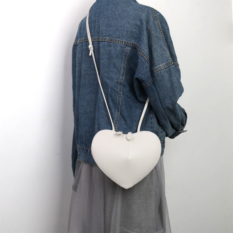 white_leather_heart_zipper_crossbody_mini_bags_4