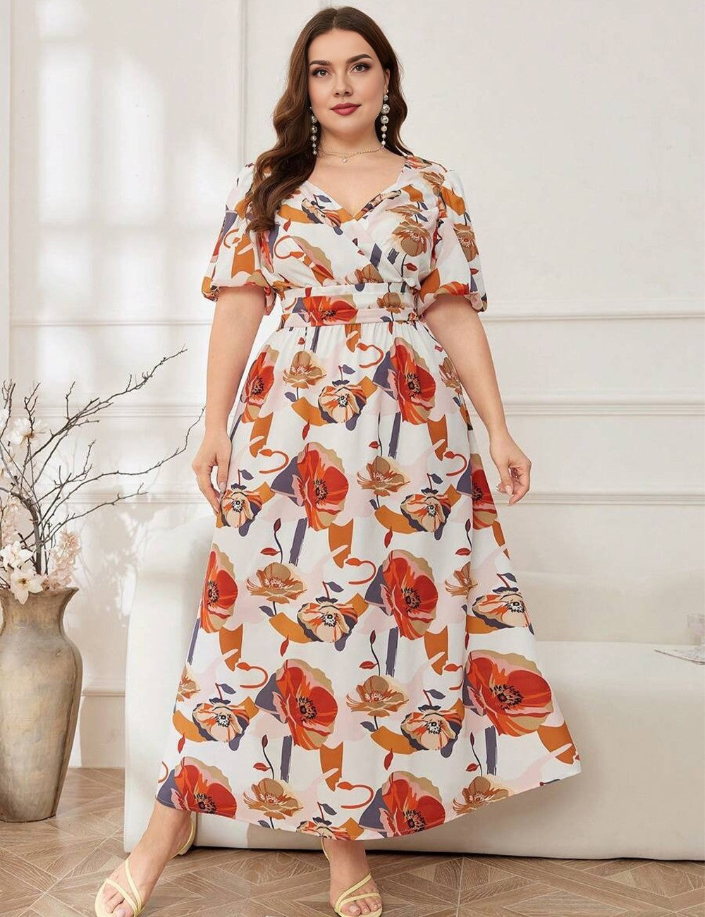 Woman wearing a floral dress in a home setting