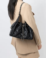  black quilted handbag with a chain detail