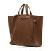 Brown leather tote bag with a shoulder strap 