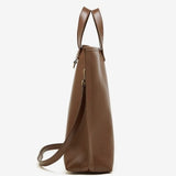 Brown leather handbag side view
