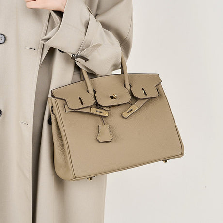 gray Full-Grain Leather Structured  Bag on the wrist