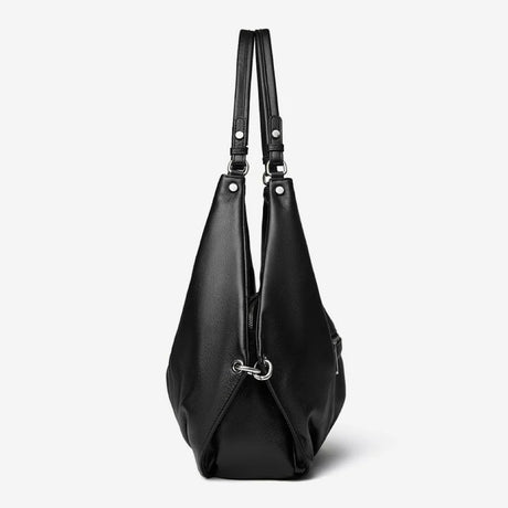 Black handbag with a strap on a white background