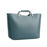 blue handbag with silver handles