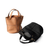 Brown and black leather handbags