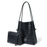 cowhide Black perforated handbag with matching pouch 