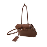 Brown handbag with a shoulder strap 