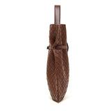 Brown woven handbag side view