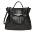 Black woven handbag with a silver clasp 