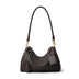 Black handbag with gold accents on a white background