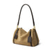 Beige handbag with black accents on a white background
