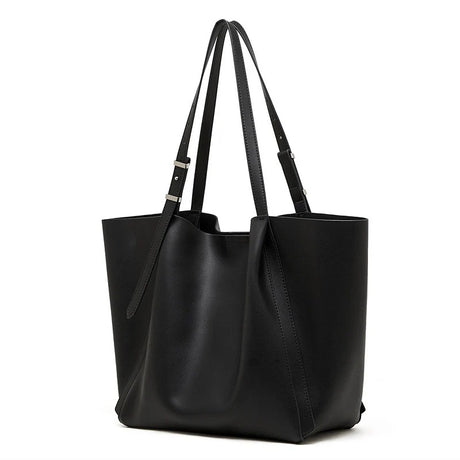 A black soft genuine leather tote bag with a clean, minimalist silhouette.