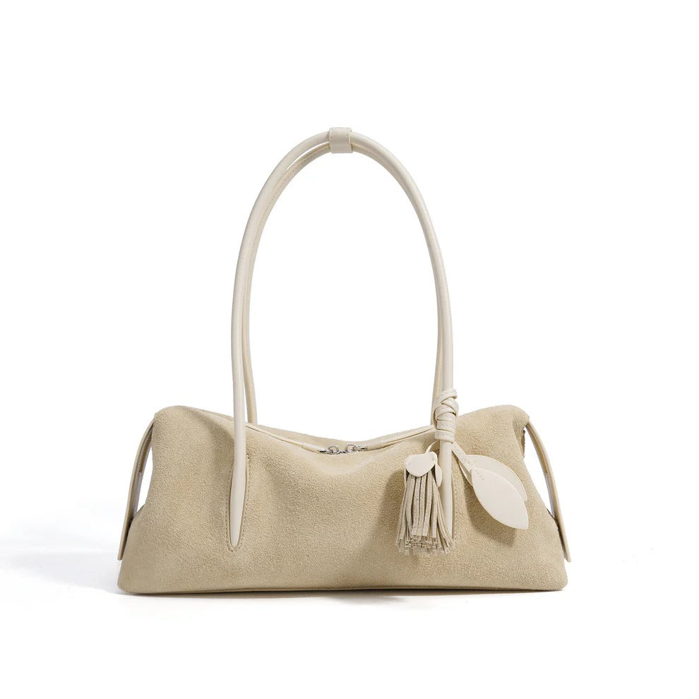 creamy white  Nubuck Leather handbag with a tassel 