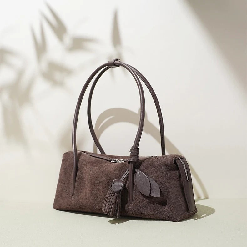 coffee Brown handbag with tassel and leaf detail 