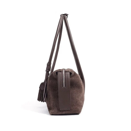 Side View of the coffee Brown suede handbag 