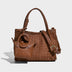 Brown woven handbag with a strap 
