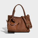 Brown woven handbag with a strap 