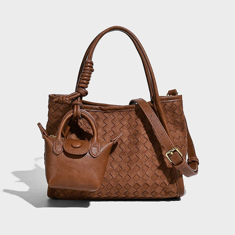 Brown woven handbag with a strap 