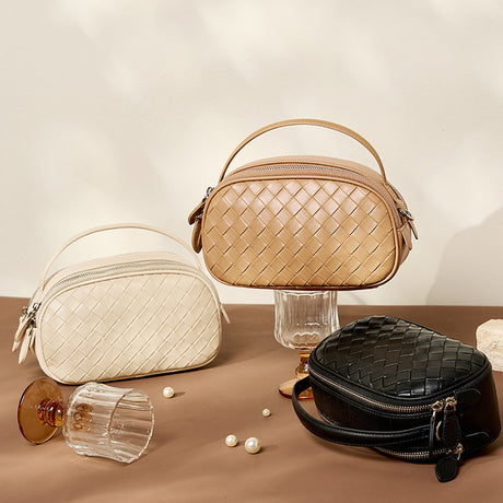 black_leather_woven_bags_top_handle_mini_crossbody_bag_1