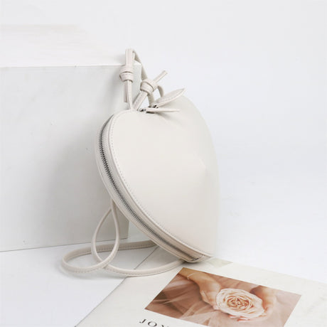 white_leather_heart_zipper_crossbody_mini_bags_1