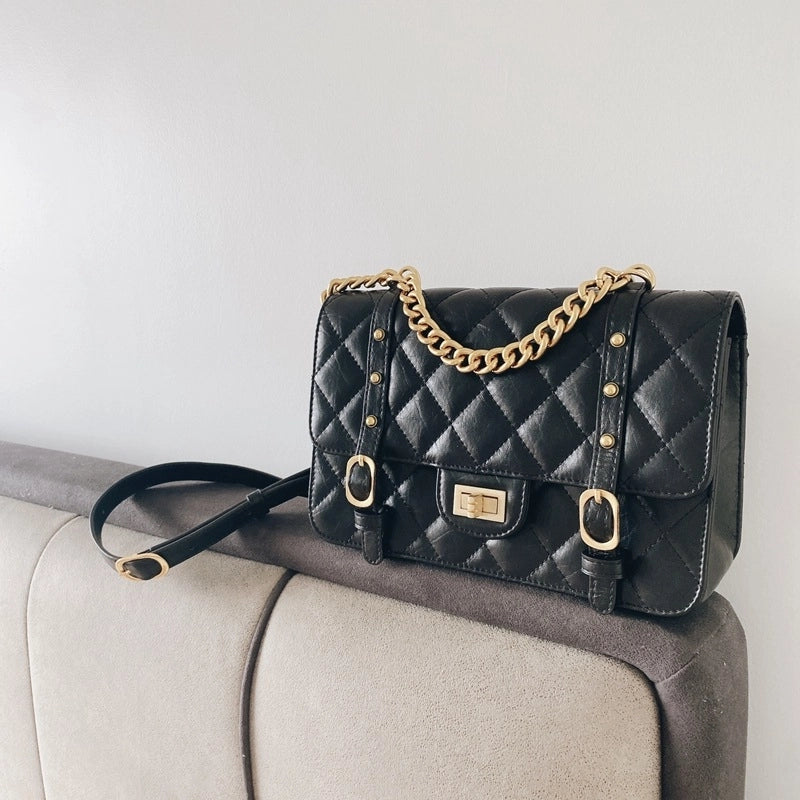 women_s_black_leather_quttied_bag_large_size_with_chain_10